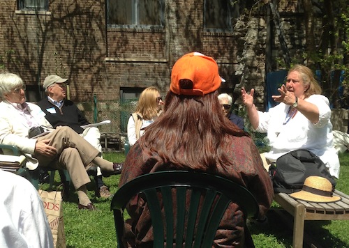 Caroline DuBois, at right, leading the owners' meeting of the New York Marble Cemetery.