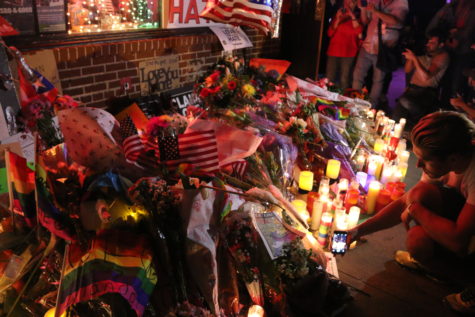 Candlelight vigil in front of the Stonewall Inn for victims of the Pulse nightclub massacre 