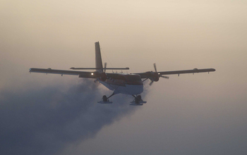 In this 2003 photo, a Twin Otter flies out of the South Pole on a previous medical flight.