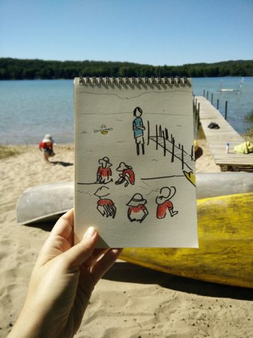 Photo of a drawing of a child playing on the beach