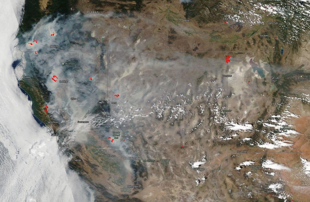 A satellite map of smoke wreathing the west coast of the USA