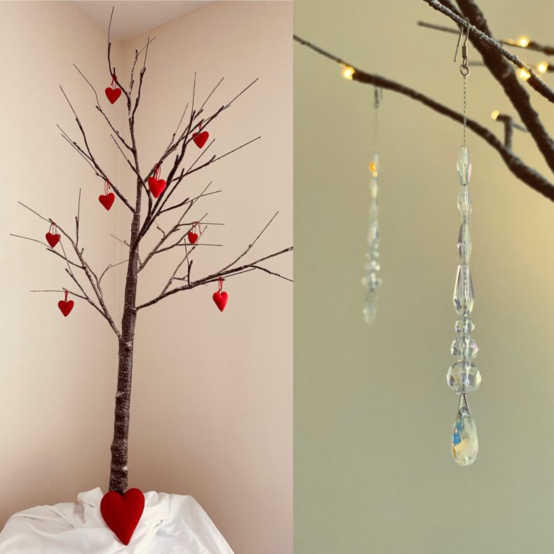 A photographic diptych showing the witch tree hung with friendly red felt hearts (L), and a closeup of one of its branches hung with dangling strings of iridescent crystal beads (R).